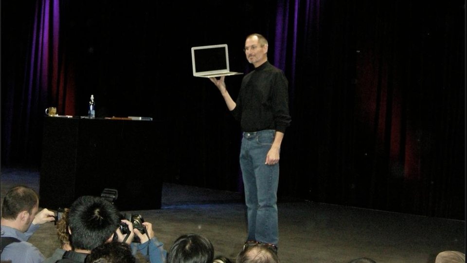 Steve Jobs holding up the MacBook Air at his 2008 Macworld keynote