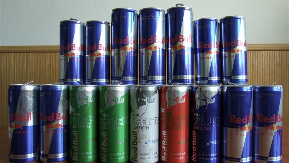 An array of Red Bull energy drink cans, including special editions